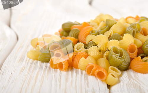 Image of Colorful pasta on a table