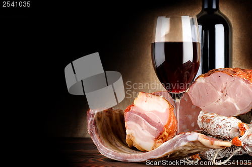 Image of Wineglass and meat