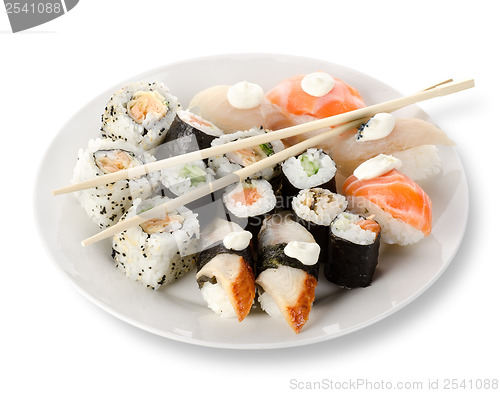 Image of Rolls and sushi in a plate