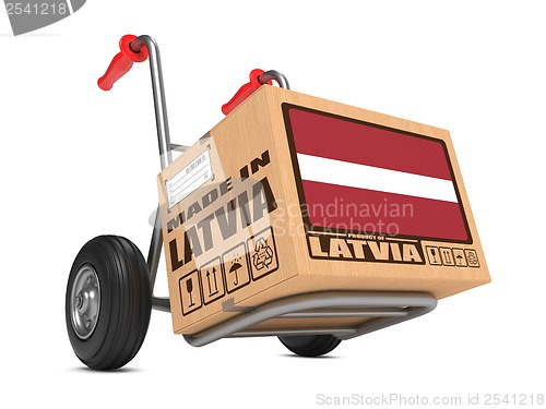 Image of Made in Latvia - Cardboard Box on Hand Truck.