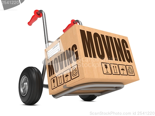 Image of Moving - Cardboard Box on Hand Truck.