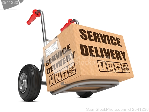 Image of Service Delivery - Cardboard Box on Hand Truck.