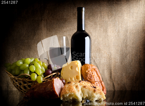 Image of Wine bottle and food