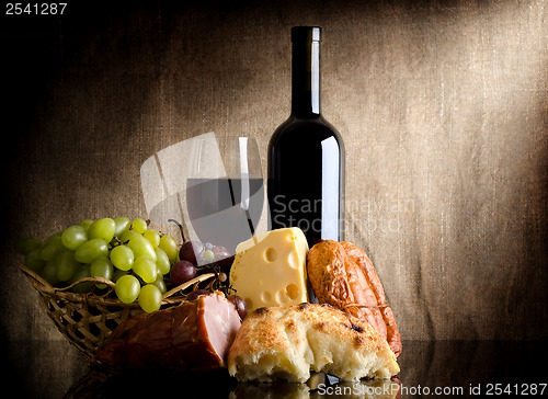 Image of Wine bottle and food
