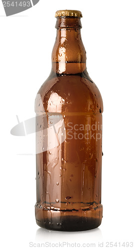 Image of Beer in a brown bottle isolated