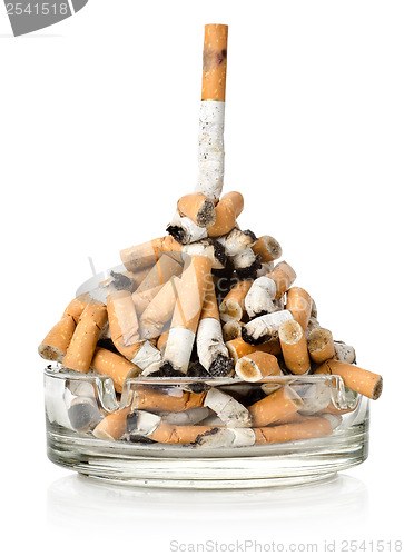 Image of Cigarettes in a glass ashtray