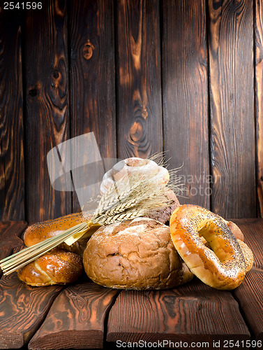 Image of Bread on a old wooden boards