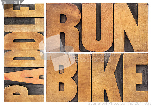 Image of run, bike, paddle - triathlon concept