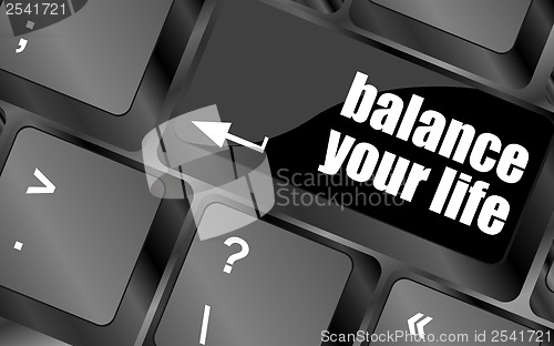Image of balance your life button on computer keyboard