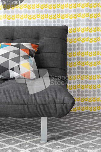 Image of Sofa with colorful cushion