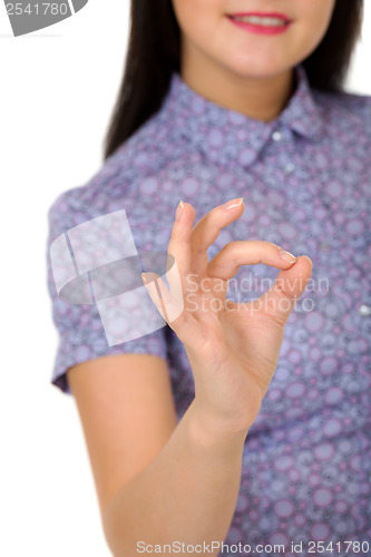 Image of girl showing OK sign