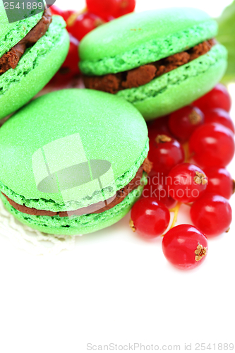Image of Almond cake with mint cream and red currant.