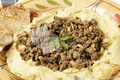 Image of Hummus with meat and bread