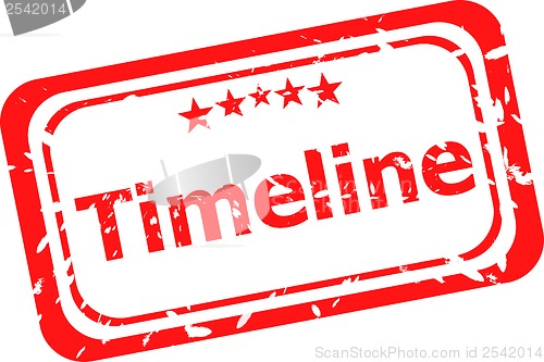 Image of timeline on red rubber stamp over a white background