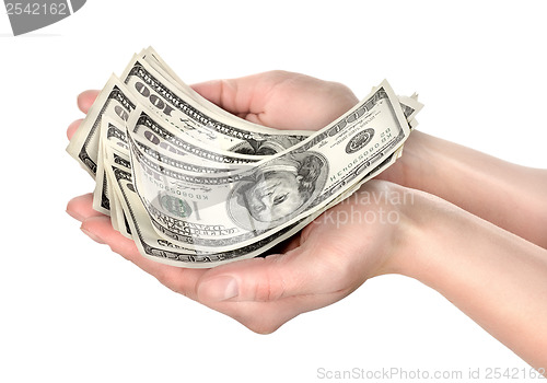 Image of Hand holds hundreds of dollars