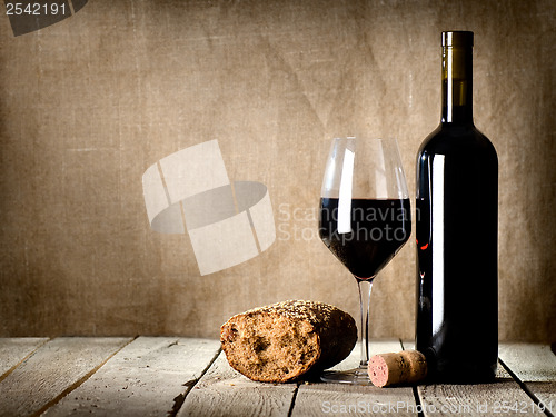 Image of Wine and  bread on the table