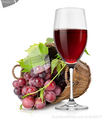 Image of Wineglass and  grapes in a basket