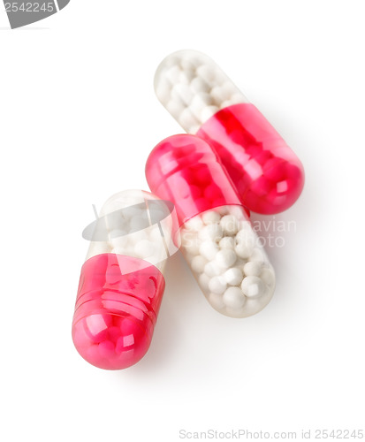 Image of three red capsules