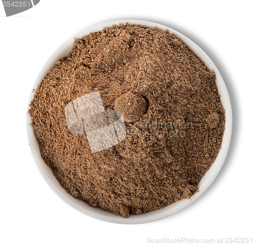 Image of Ground pepper in plate isolated