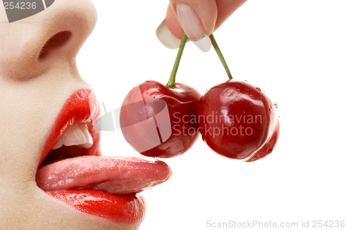 Image of cherry, lips and tongue