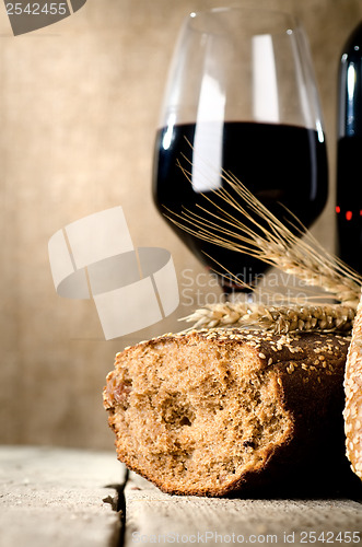 Image of Wine, bread and wheat