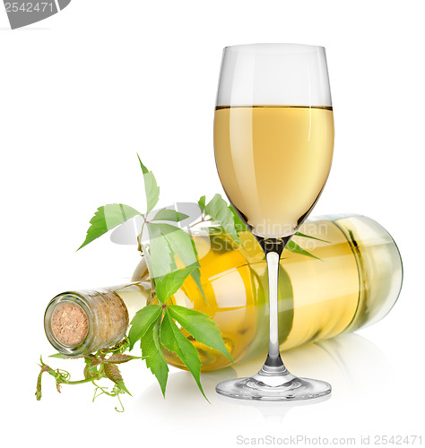 Image of White wine glass and vine