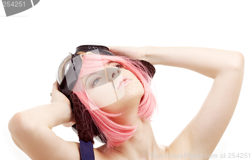 Image of daydreaming pink hair girl in aviator helmet