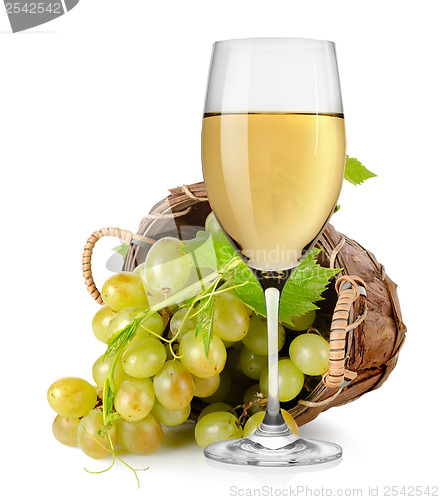 Image of White wine and  grapes in a basket