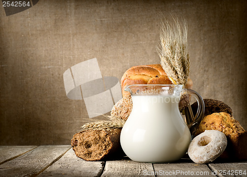 Image of Milk and bread on canvas
