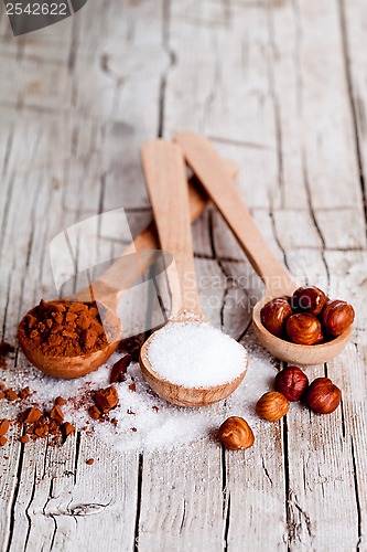 Image of sugar, hazelnuts and cocoa powder