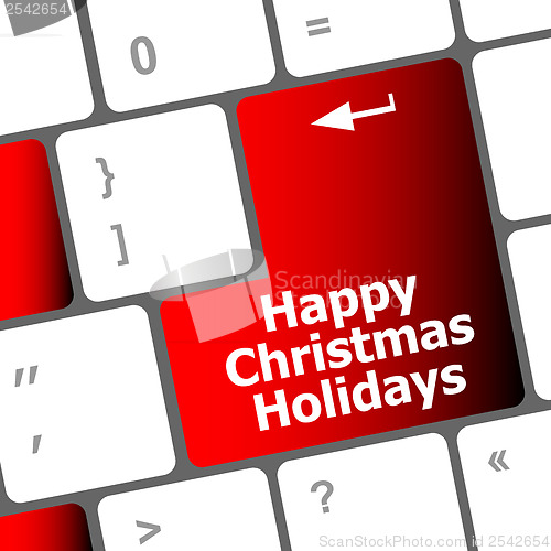 Image of happy christmas holidays button on computer keyboard key