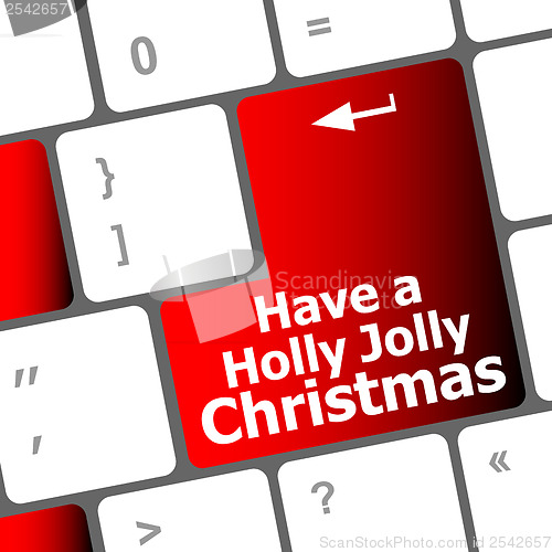 Image of Computer keyboard key with have a holly jolly christmas words