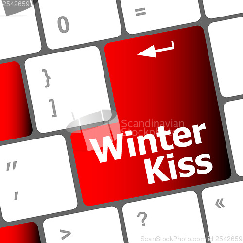 Image of winter kiss on computer keyboard key button