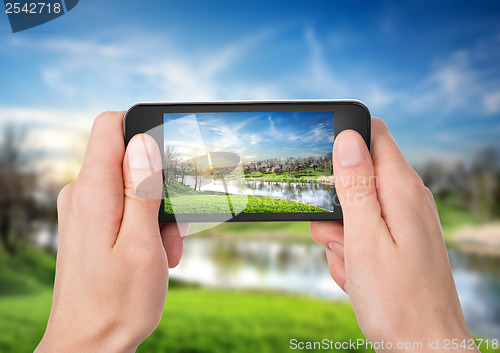 Image of Phone and spring landscape