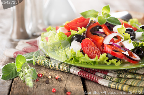 Image of Vegetable salad on a wooden table