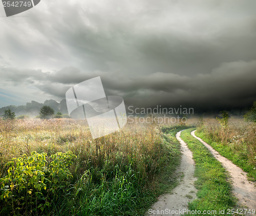 Image of Storm clouds and road