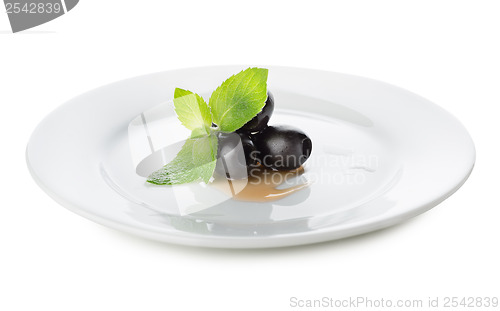 Image of Olives on a white plate