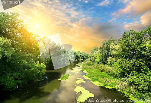 Image of Quiet river at sunset