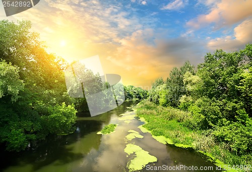 Image of Quiet river at sunset