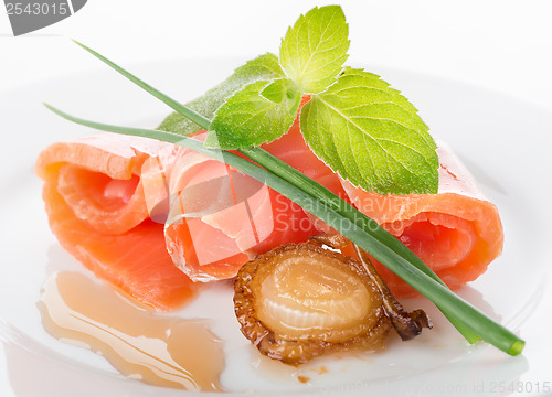 Image of Salmon rolls with greens and fried onion