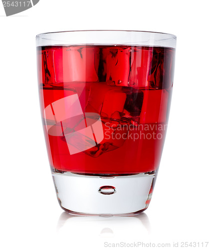 Image of Red drink with ice cubes in a glass