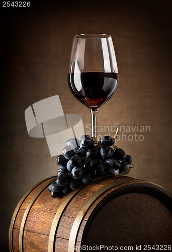 Image of Wine goblet and barrel