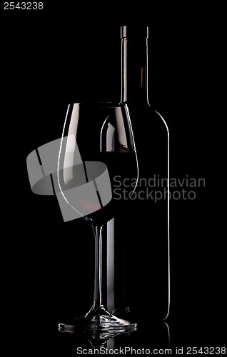 Image of Glass and bottle of wine