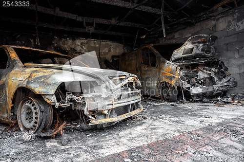 Image of Close up photo of a burned out cars