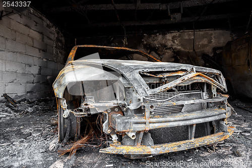 Image of Close up photo of a burned out car