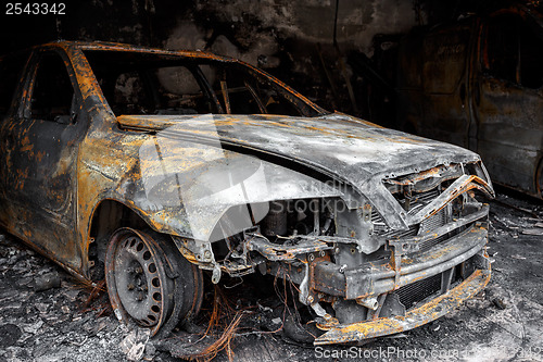 Image of Close up photo of a burned out car