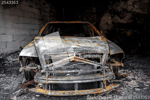 Image of Close up photo of a burned out car