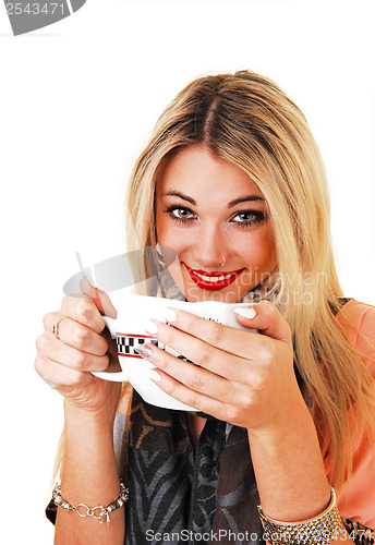 Image of Girl drinking soup.