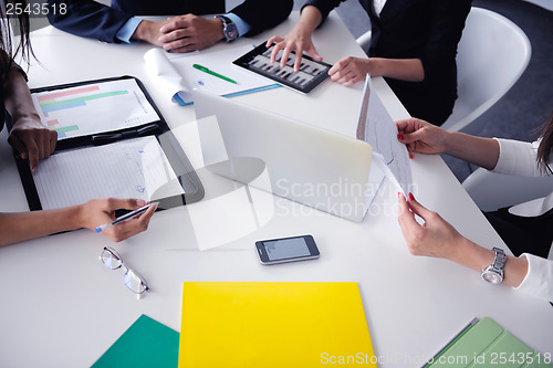 Image of business people group in a meeting at office