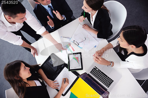 Image of business people group in a meeting at office